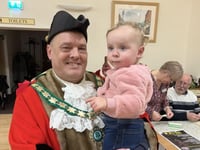 Former mayor wins district council seat
