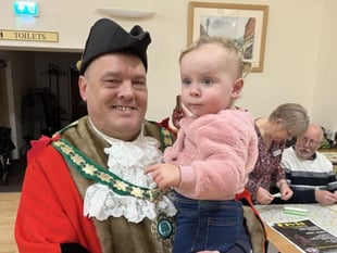Former mayor wins district council seat
