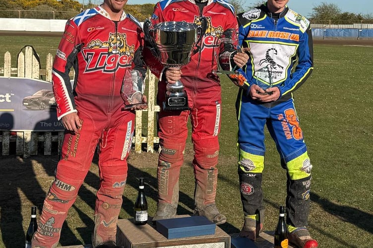 Cornishman Chris Harris (centre) celebrates his Championship League Riders’ title  success alongside Kyle Howarth (left) and Steve Worrall (right)
