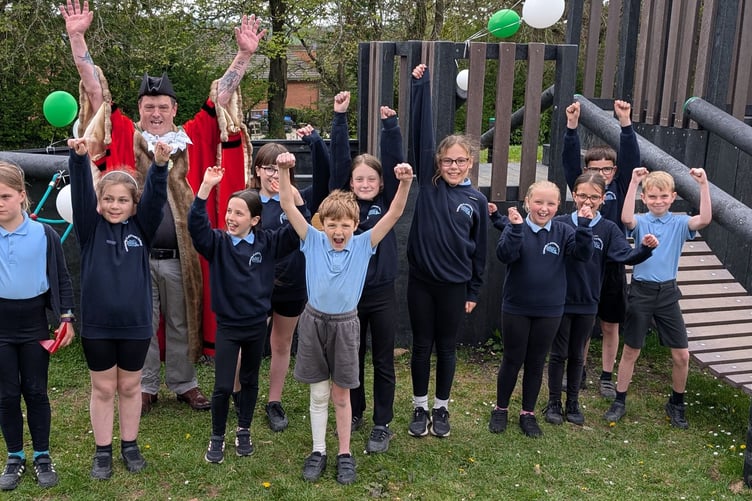 A delighted group of school children and Cllr Nigel Kenneally, the mayor of Holsworthy after the HMS Gladiator was declared officially open. (Picture: Aaron Greenaway/Tindle)