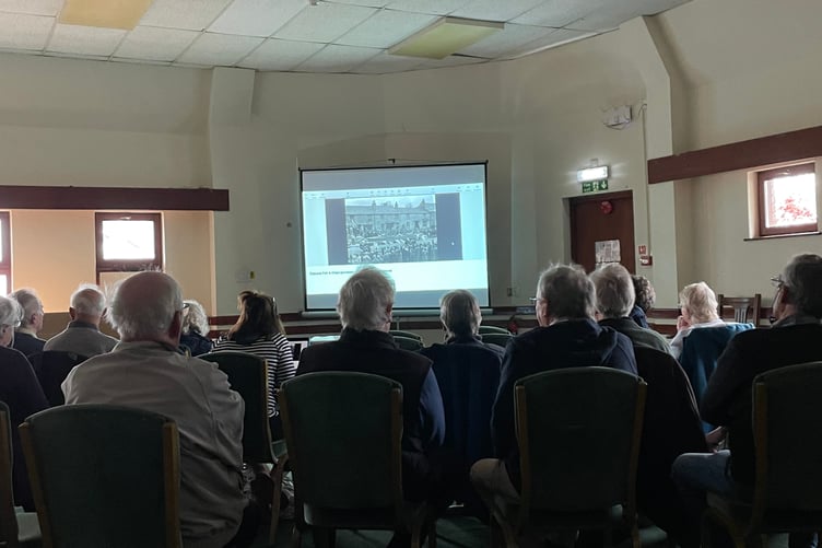 The group identifying pictures which are held in the archive by Kresen Kernow. (Picture: Aaron Greenaway/Tindle)