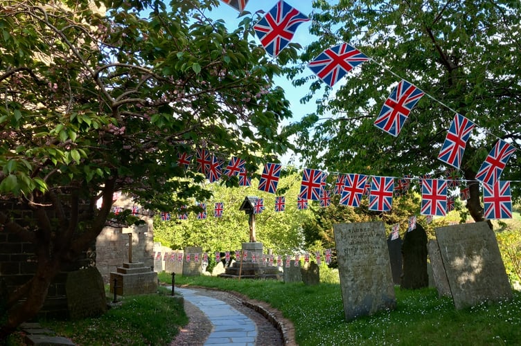 The churchyard entrance to St Andrew's Church, Stratton during VE Day celebrations