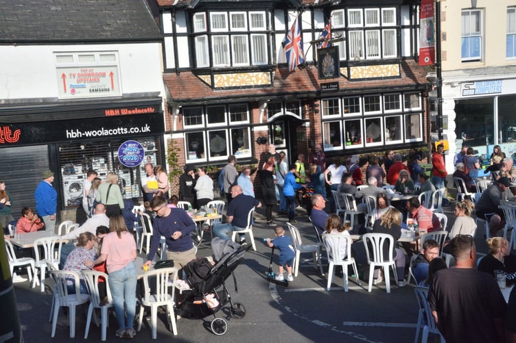 Residents from across Holsworthy take to the streets to enjoy fish or sausage and chips in a street party to mark 80 years since the end of war in Europe. (Picture: Rodney Parrish)