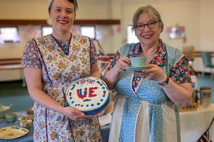Laura and Pam, the duo behind the excellent Homefront Kitchen Girls, with a cup of tea and VE day victory cake. (Picture: Aaron Greenaway)