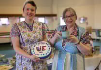 WWII fans live 1940s-style to save museum