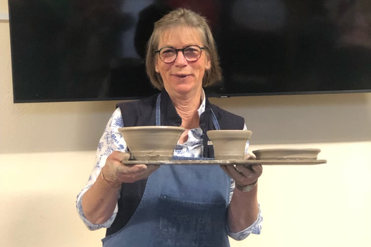 Members of South Hill WI proudly showed of their completed pots after an informative demonstration by local potter Ben McManigan of Polyphant