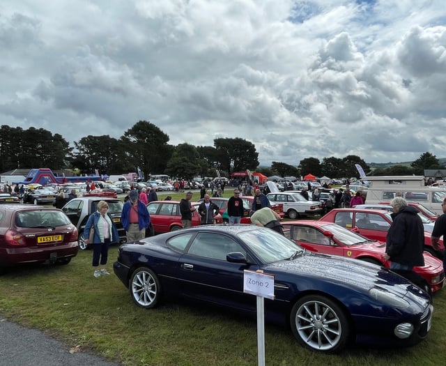 Thousands brave the rain to attend popular car show
