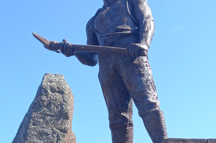 Bronze statue of a miner at the entrance to Geevor tin mine, sculpted by Colin Caffell