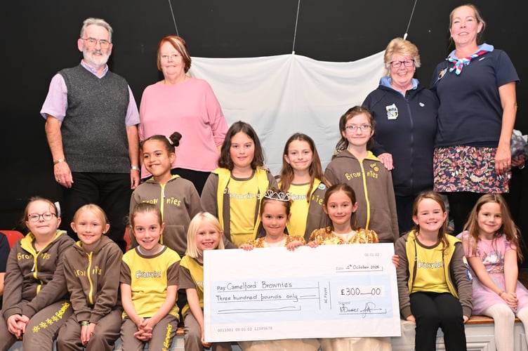 The Camelford Brownies were overjoyed to receive a cheque from David Goodman (Camelford carnival committee member) and Marney Baker (Camelford carnival secretary) for the sum of three hundred pounds raised from last year's carnival collection. (Picture: Adrian Jasper)