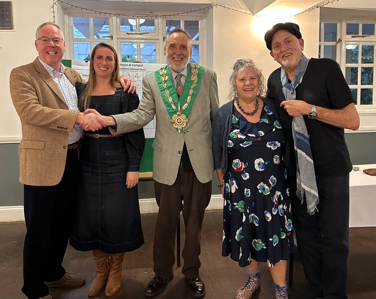 The winning team congratulated by the Area Chief Ranger