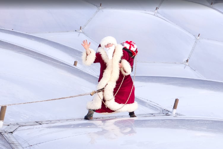 Father Christmas on the outside of a biome at the Eden Project.