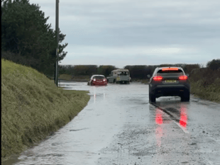 Cornwall roads flooded by heavy rain