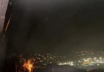 Power lines captured sparking and burning across Cornwall