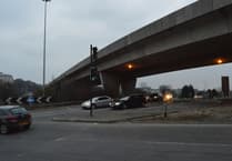 Man dies after fall from flyover onto A38