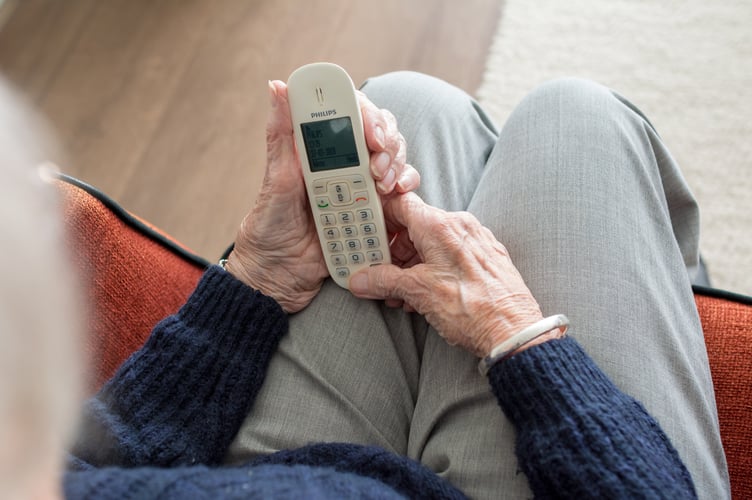 Elderly person using phone