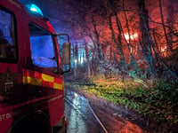 Fire crews tackle garage blaze