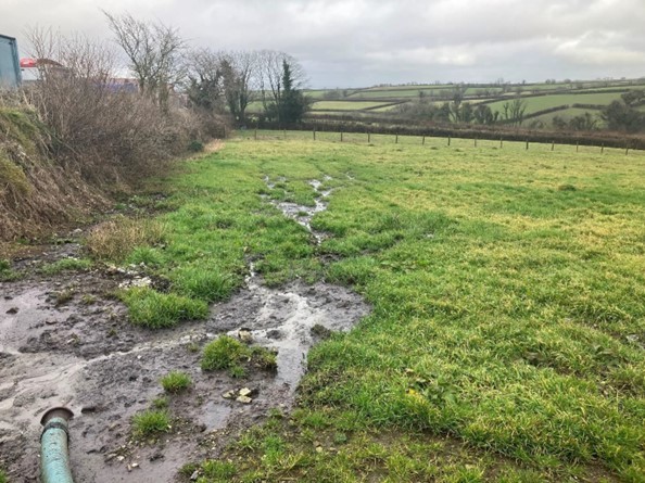 A tanker pipe was discovered draining directly into the field entrance