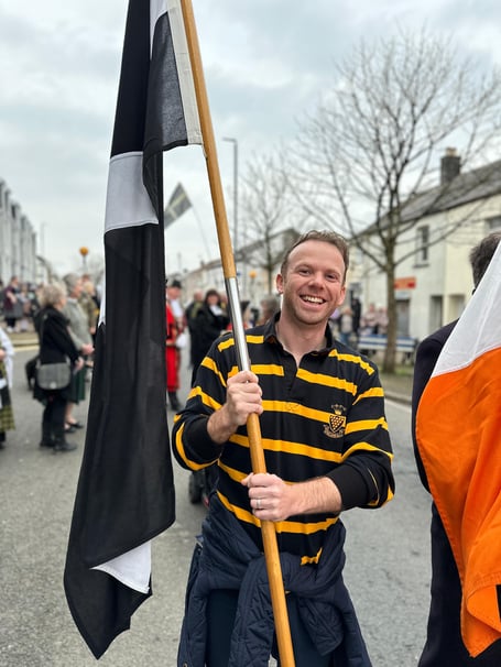 Ben Maguire flying the flag for Cornish heritage in Bodmin during the St Piran's Day parade