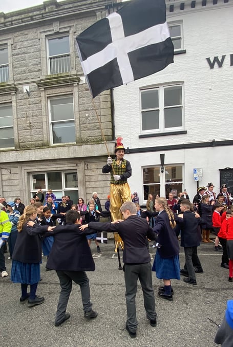 Stilt walker Ross Wheeler, from Hotch Potch Performance, brought a touch of whimsy to proceedings, helping encourage the children as they took part in 'Mr Martin's Reel' dance