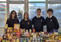 Students 'blown away' by generosity following foodbank donation drive