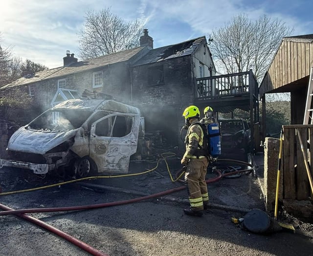 Fire crews battle two vehicle blaze in Cardinham 