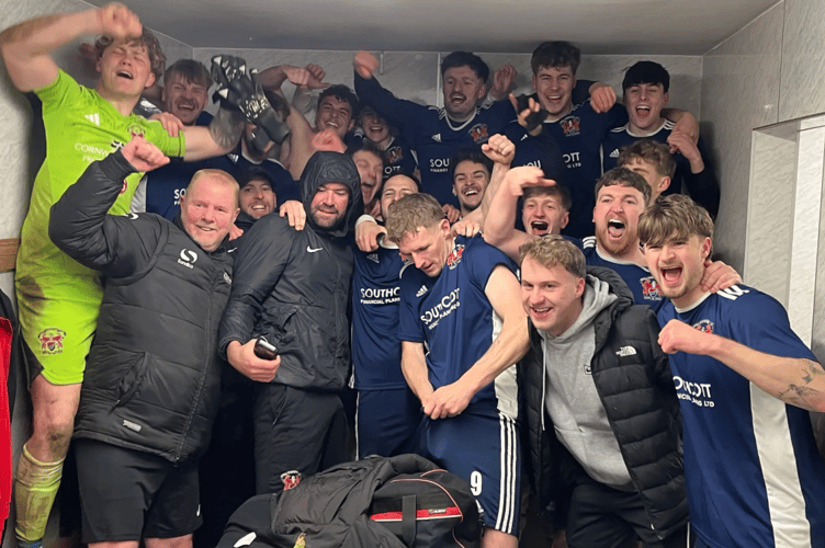 Callington players celebrate in the dressing room. Pictures by Kevin Marriott.