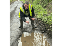Calls for residents to help report potholes