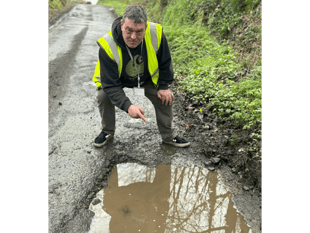 Calls for residents to help report potholes