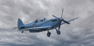 Crowds marvel as iconic Spitfire flies over the skies of Cornwall