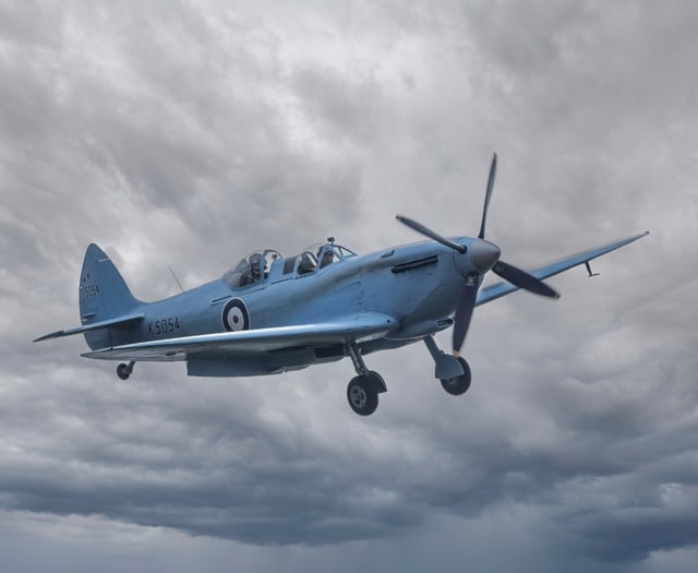 Crowds marvel as iconic Spitfire flies over the skies of Cornwall