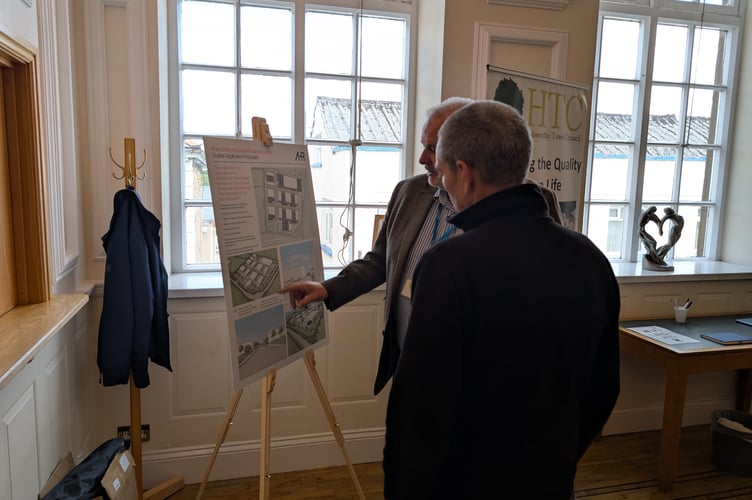 Mayor of Holsworthy Cllr Jon Hutchings being shown the plans