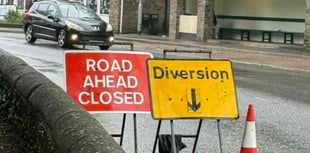 Mayor calls for business signs