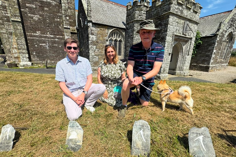 People gathered at the 39 commemorative slates at St Newlyn East Church