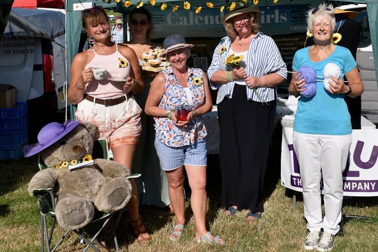Members of Teylu Theatre Company enjoying the sunshine and promoting their Calendar Girls production (Jon Harris Photography)