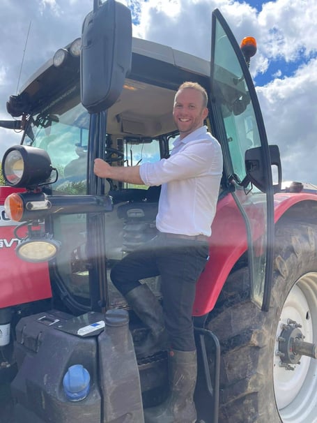 MP Ben Maguire climbing into a tractor (Picture: Ben Maguire) 