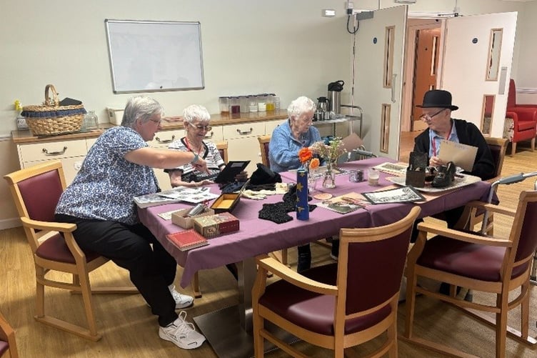 Pauline Underwood of the museum outreach team, with residents Dilys Seagar, Sylvia Wheeler and Raymond Prouse. (Picture: Camelot Care)