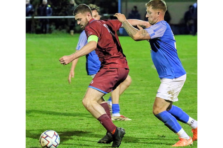 Launceston frontman Lee Robinson, pictured at Camelford last Friday, grabbed both goals at Pennygillam.